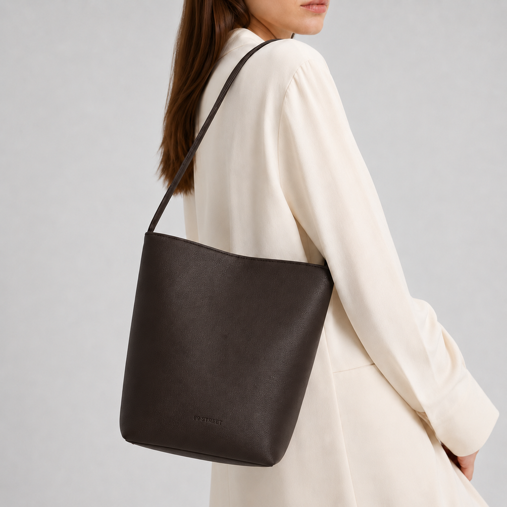 The Corner Bag in dark brown